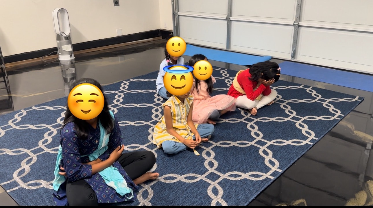 Instructor teaching young dance students